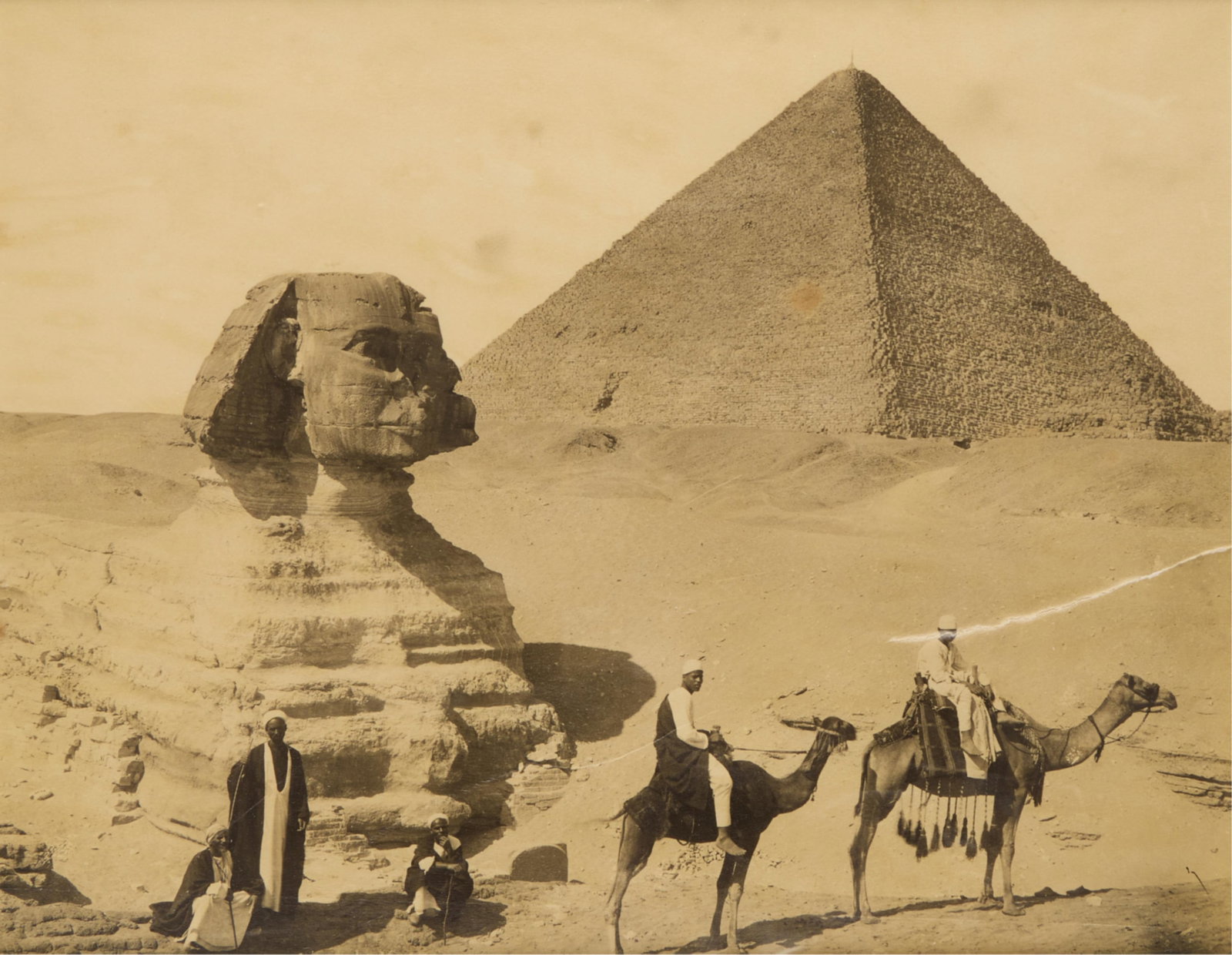Early 20th c. Albumen of Giza Sphinx w/ Pyramid: Early 20th century albumen photograph print depicting figures posing on camelback in front of the Great Sphinx and the Great Pyramid of Giza. Possibly depicting the von Hallwyls family trip to Egypt a