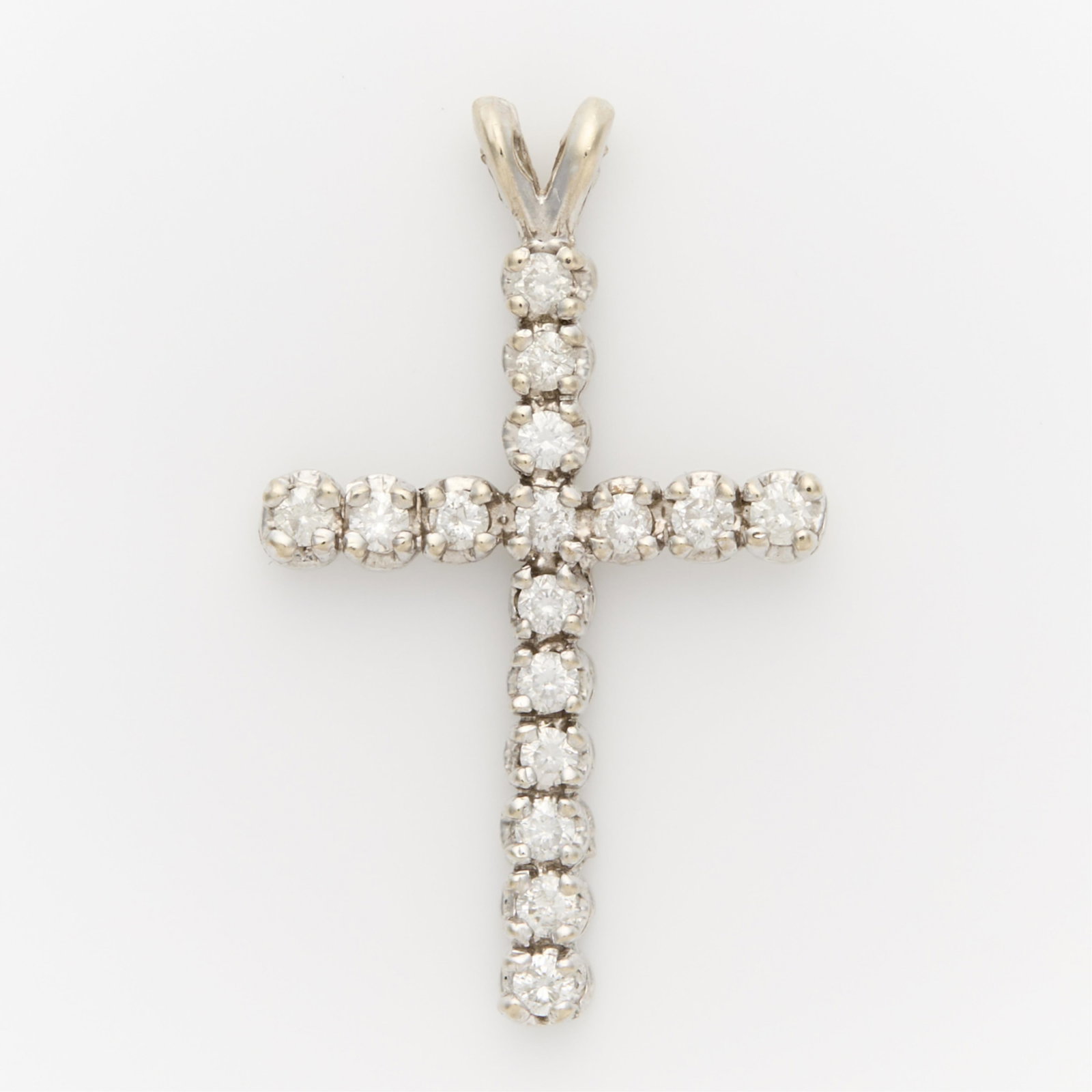 14k White Gold & Diamond Cross: 14k white gold cross with rabbit ear bale set with 16 round full cut diamonds approximately 0.66 ctw, H color, I1 clarity. Unmarked, tested 14k. Chain for photography purposes only, not included with 