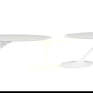 Eero Saarinen for Knoll MCM Tulip Table: Eero Saarinen (American, 1889-1966) for Knoll International, New York, United States. Mid-century modern oval white tulip pedestal base table, 1956. Composite melamine top with a solid cast aluminum b