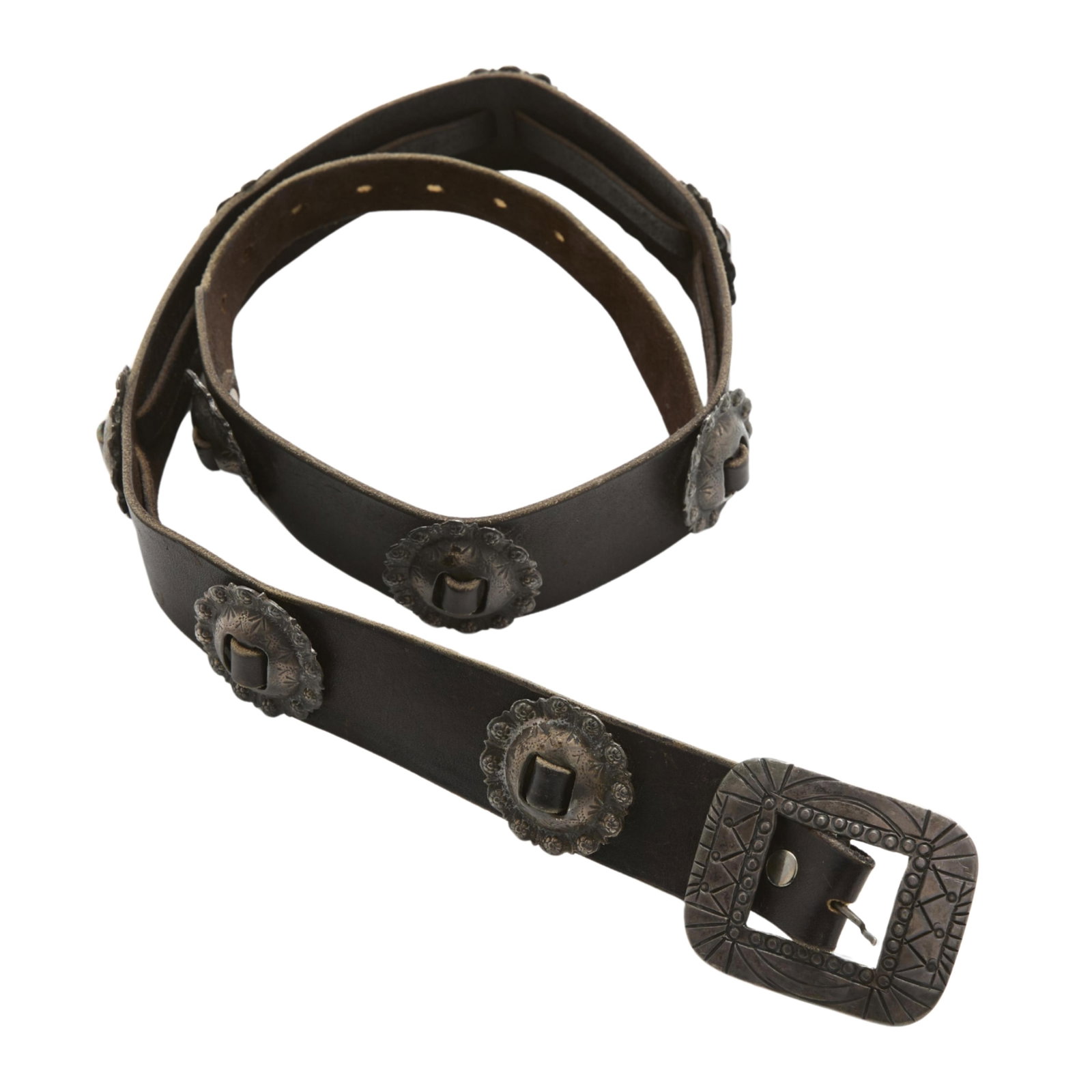 Leather Belt with Conchos ca. 1940-1950: Dark brown leather belt set with nine conchos and a rectangular buckle with incised linear details. The buckle and conchos from circa 1940-1950. Length: 39 1/2 in. Gross weight: 249.8 g.