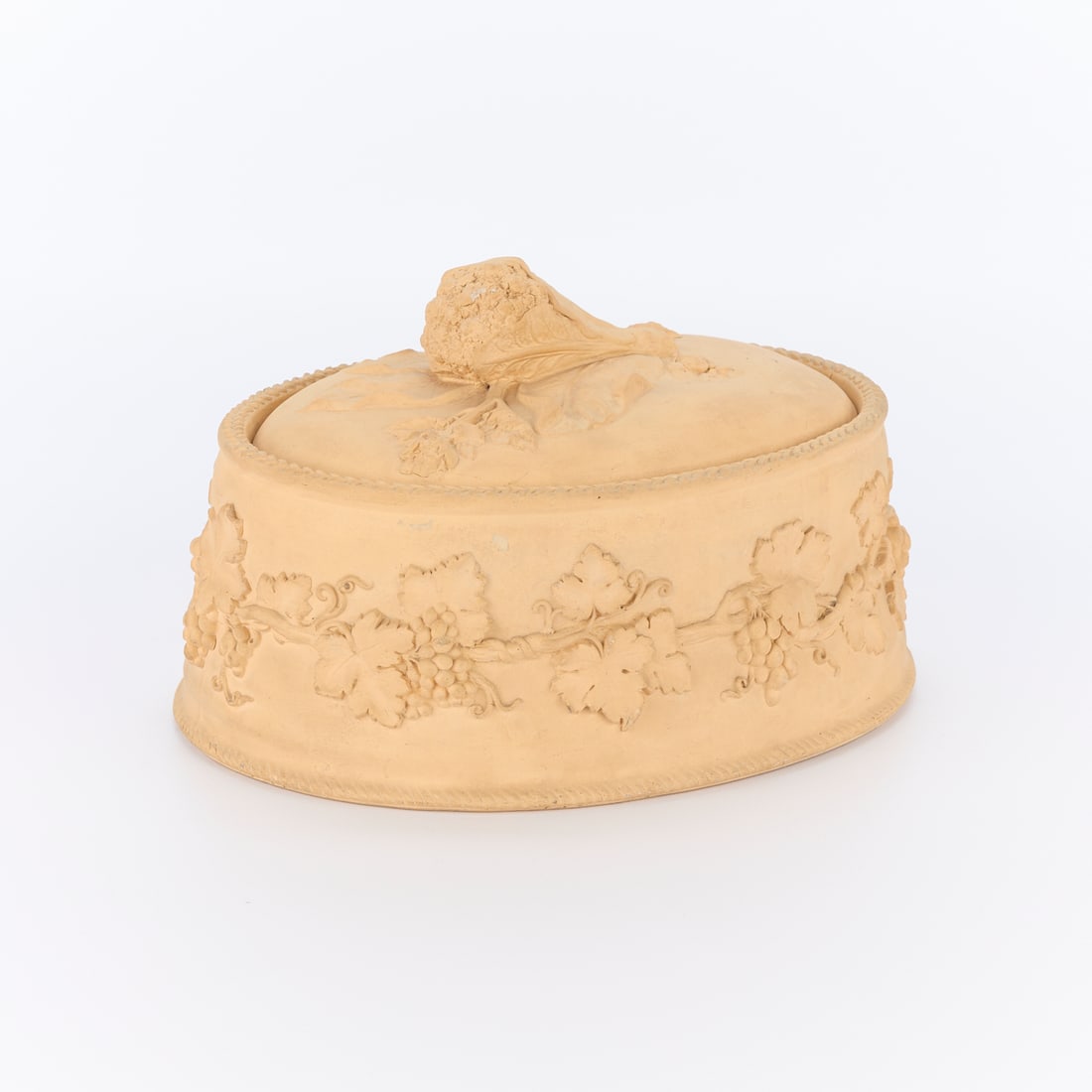 19th c. Wedgwood Caneware Pie Dish: Wedgwood, England. 19th century caneware pie dish or casserole with cover. The side decorated with grape vines and the lid knop in the form of a cabbage. Impressed mark along the underside. Provenance
