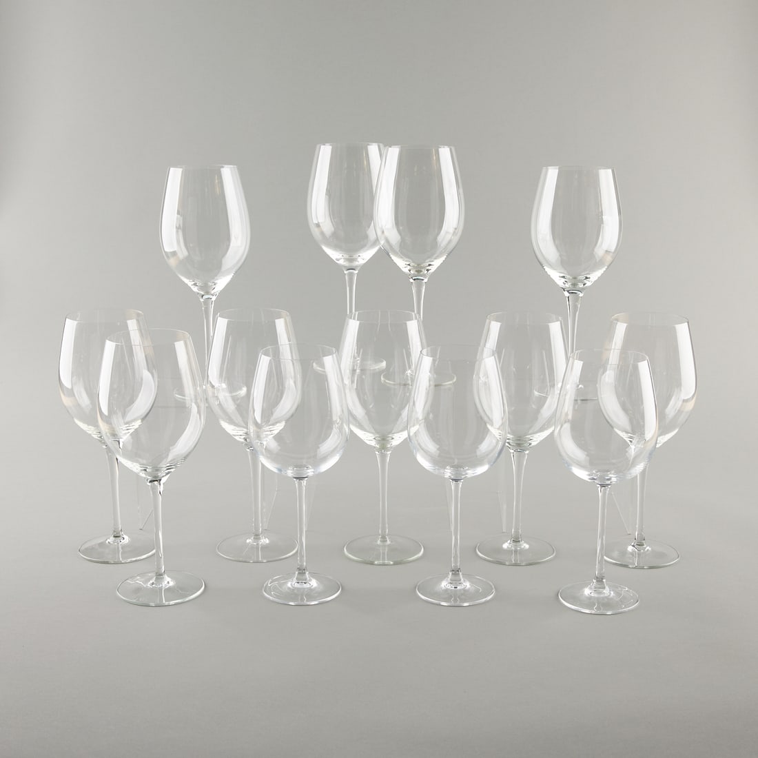 Group of 13 Large Wine Glasses: Group of thirteen large wine glasses. Provenance: From the Collection of Lynne Rossetto Kasper. (Each) height: 10 3/4 in x diameter: 1/4 in.