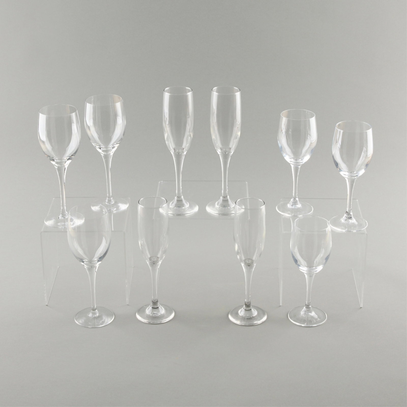 Group of 13 Wine Glasses & Stemware: Group of thirteen variously sized wine glasses. Three not photographed (two champagne glasses and one small wine glass). Provenance: From the Collection of Lynne Rossetto Kasper. Height ranges from 7 