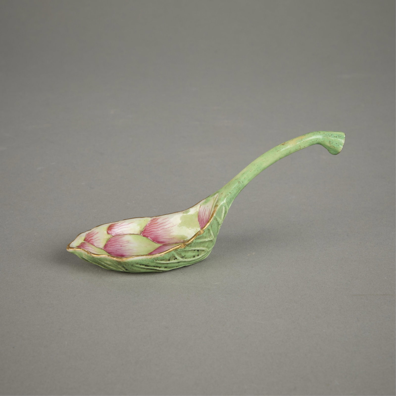 Chinese Qing Lotus Form Porcelain Spoon: Chinese Qing dynasty porcelain spoon, early 19th century. Molded in the form of a lotus in apple-green and pink. Provenance: Ming to Ch'ing Antique Oriental Arts, Chicago, 1981. Length: 5 1/2 in.