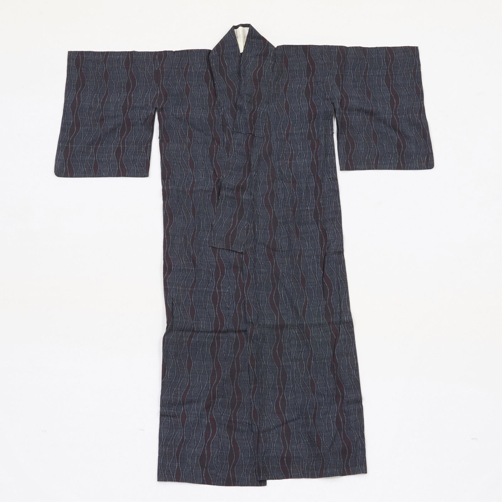 20th c. Japanese Kasuri Ikat Indigo Kimono Robe: Japanese kasuri ikat kimono robe, early 20th century. With woven indigo-dyed sinuous or wave motifs throughout.Provenance: From the Distinguished Personal Collection of Dr. Robert Jacobsen.Length: 59