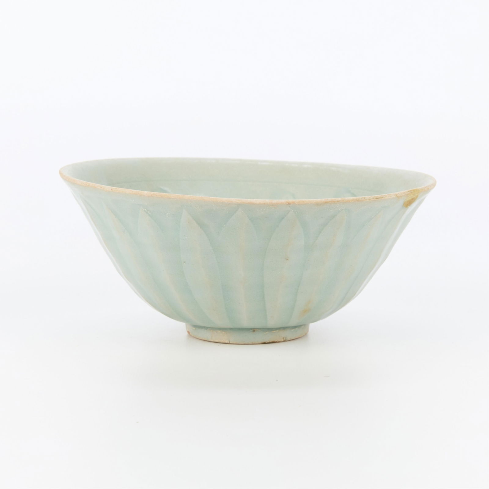 Chinese Longquan Celadon Lotus Bowl: Chinese Longquan pale celadon glazed lotus bowl. With incised floral patterns along the interior.Provenance: From the Distinguished Personal Collection of Dr. Robert Jacobsen.Height: 3 in x diameter:
