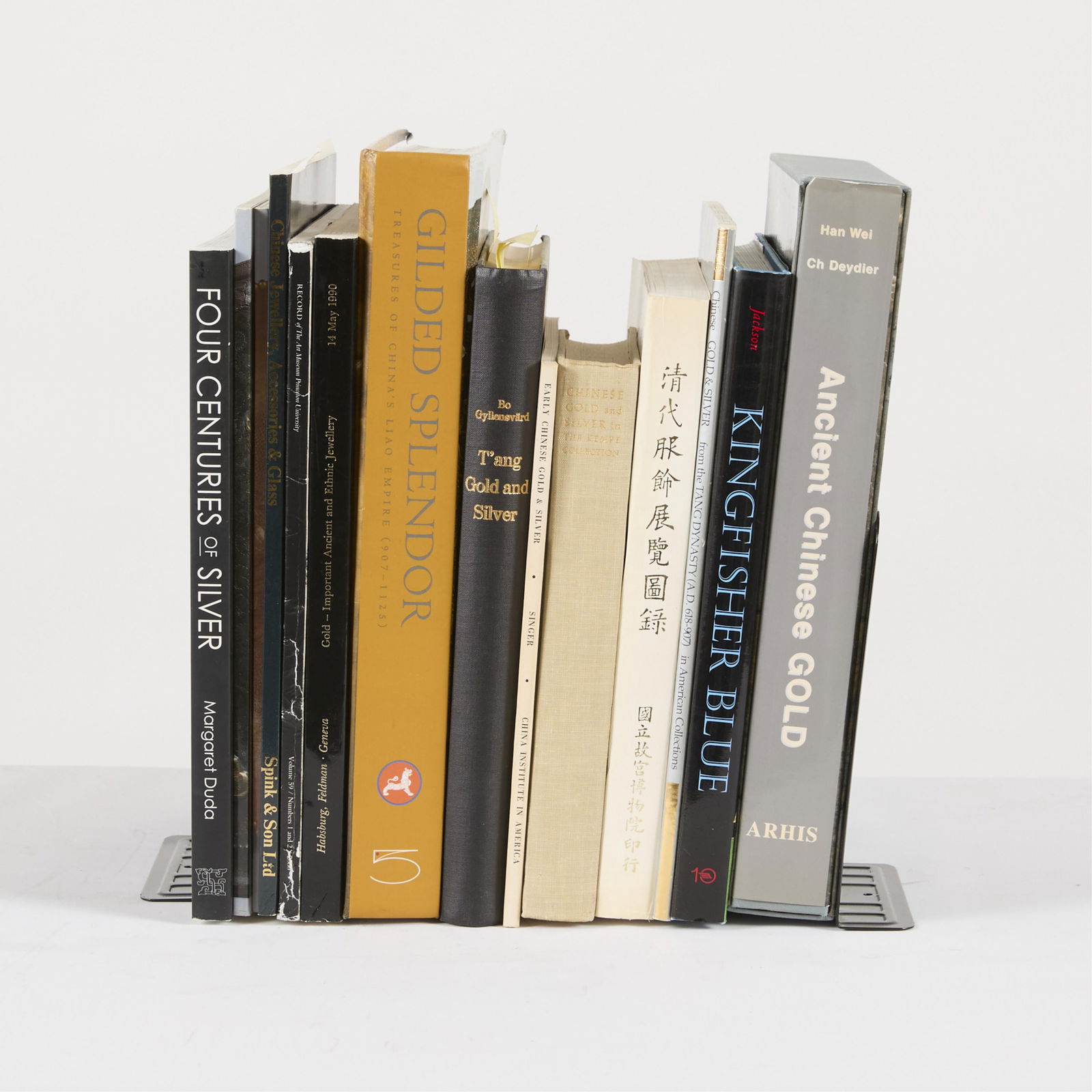 14 Books on Chinese Gold & Silver Work: Group of 14 books related to Chinese gold and silver work. In English and Chinese.Provenance: From the Distinguished Personal Collection of Dr. Robert Jacobsen.(Shipping dimensions) Height: 12 1/2 in