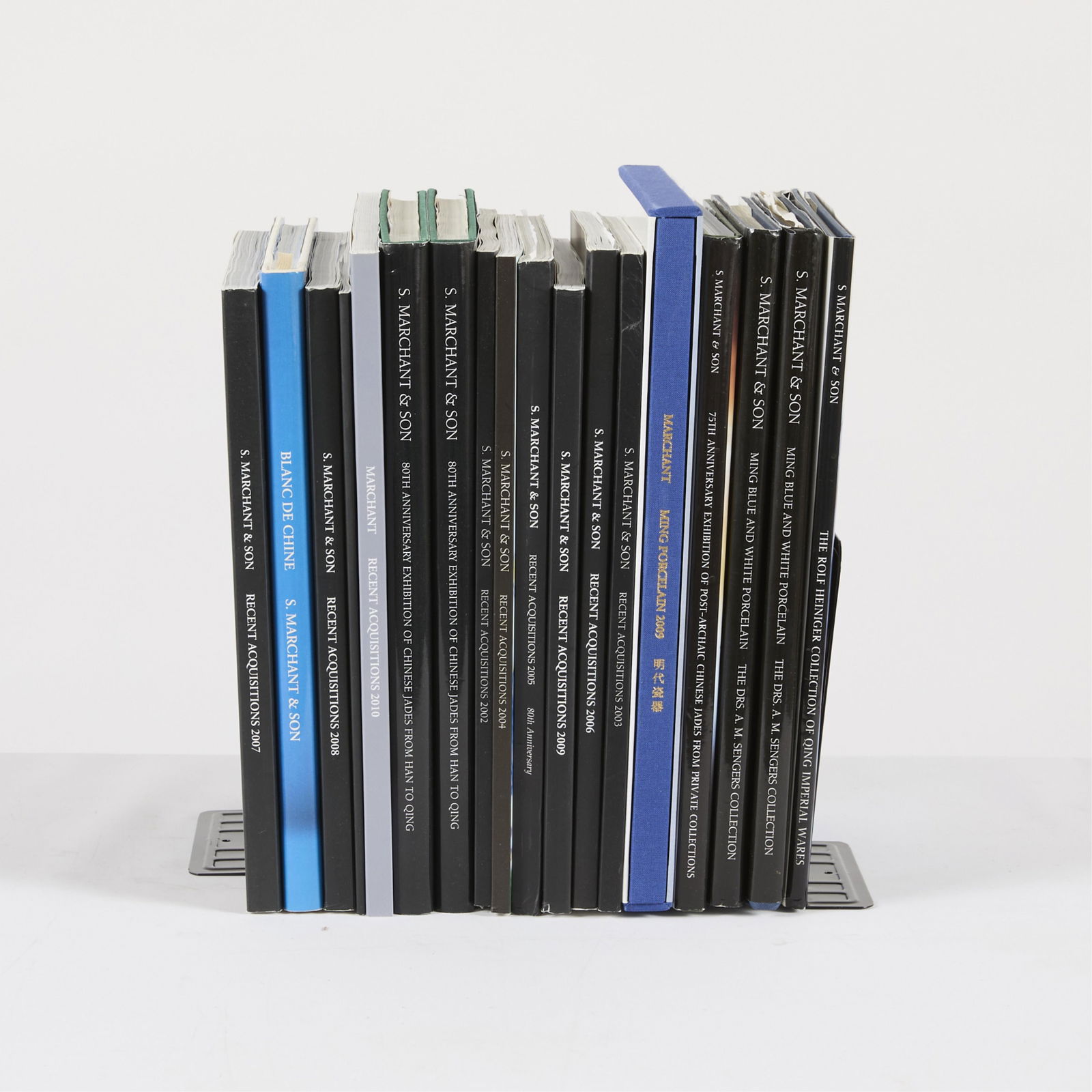 Group 18 Marchant Catalogs: Group of 18 S. Marchant & Son catalogs pertaining to Asian art.Provenance: From the Distinguished Personal Collection of Dr. Robert Jacobsen.(Shipping dimensions) height: 12 1/2 in x width: 25 in x de