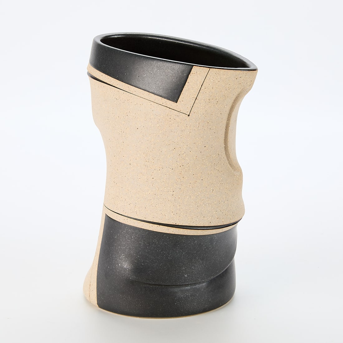 Gustavo Perez Ceramic Vase: Gustavo Perez (Mexican, b. 1950). Ceramic vase in black and buff. Signed and numbered [illegible]-147 along the underside. With a pamphlet from an exhibition at Frank Lloyd Gallery.Exhibition: Frank L