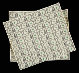 2 Sheets Uncut 1995 $1 Bills: Two uncut sheets of U.S. 1995 $1 bills. 32 bills per sheet, 64 total bills.Each sheet, height: 21 in x width: 25 in.