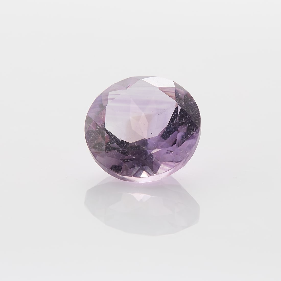 2.20 Ct Amethyst: One 2.20 carat round cut amethyst. Diameter: 8.82 mm x depth: 5.12 mm. Gross weight: 2.20 ct.
