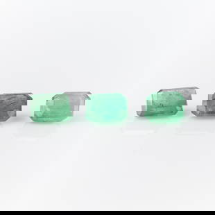 3 Emeralds 1.10 Ctw: Group of three step cut emeralds, two with clipped corners, one with out. Each approximately 0.35 ct.(Each, approximately) Length: 4.66 mm x width: 3.81 mm x depth: 2.34 mm. Gross weight: 1.10 ctw.