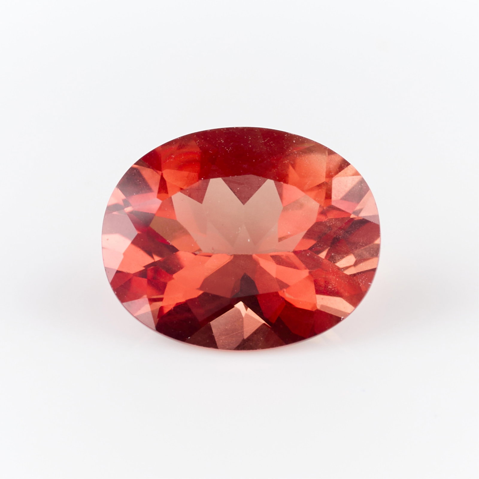 2.95 Ct Spessartine Garnet: One 2.95 ct oval cut spessartine garnet. Length: 10.98 mm x width: 8.94 mm x depth: 5.83 mm. Gross weight: 2.95 ct.
