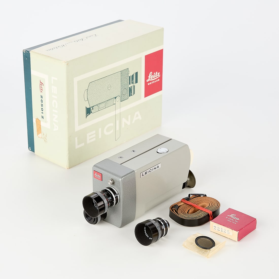 Leica Leicina 20501z 8mm Electric Movie Camera: Leica, Germany. 20501z 8mm electric movie camera, Leicina 8s, produced in 1961. With 15mm Dygon f2 and 9mm f2 Dygon-Vorsatz lens (serial #1870365). With original packaging and manual. (Packaging) heig