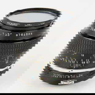 Nikon Micro-Nikkor K 55mm f3.5 Lens: Nikon, Japan. Lens, 55mm, f3.5 Micro-Nikkor K, Serial #874264, produced 1975-1977. With a Nikon HN-3 lens hood, a Promaster 52mm UV lens filter, and a case.(Case) height: 5 1/2 in x diameter: 3 1/2 in