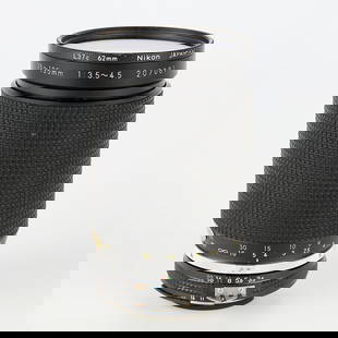 Nikon Zoom-Nikkor AF 35-135mm f3.5-4.5 Lens: Nikon, Japan. Lens, 35-135mm, f3.5-4.5 Zoom-Nikkor AF, Serial #207081, produced 1986-1988. With a Nikon L37c 62mm lens filter and a plastic case.(Case) height: 6 1/2 in x diameter: 4 in.