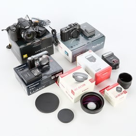 3 Assorted Digital Cameras & 3 Canon Accessories