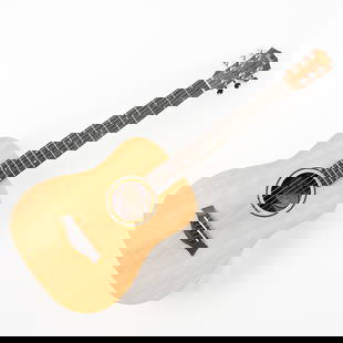 Baby Taylor BT1 Acoustic Guitar: Small three quarter size acoustic guitar from Taylor Guitars from the Baby Taylor Series with model number BT1. Serial number 2112147437. Comes with Taylor branded soft travel case.Height: 34 1/4 in x
