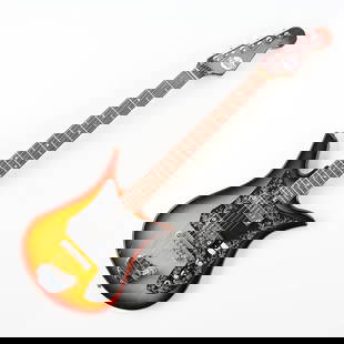 Teisco Del Rey ET-200 Electric Guitar 1960s: Vintage electric guitar from Teisco Del Rey, most likely model number ET-200, also called Tulip for the shape of the body. Wonderful sunburst color with black and floral pick guard. Brand medallion on