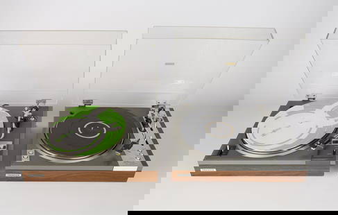2 Pioneer Turntables Models PL-115D & PL-117D: Pioneer Electronic Corporation, Japan. Group of two vintage turntables including one automatic return stereo and one full automatic stereo. Including: Model PL-115D, serial number WE35776NP; Model PL-