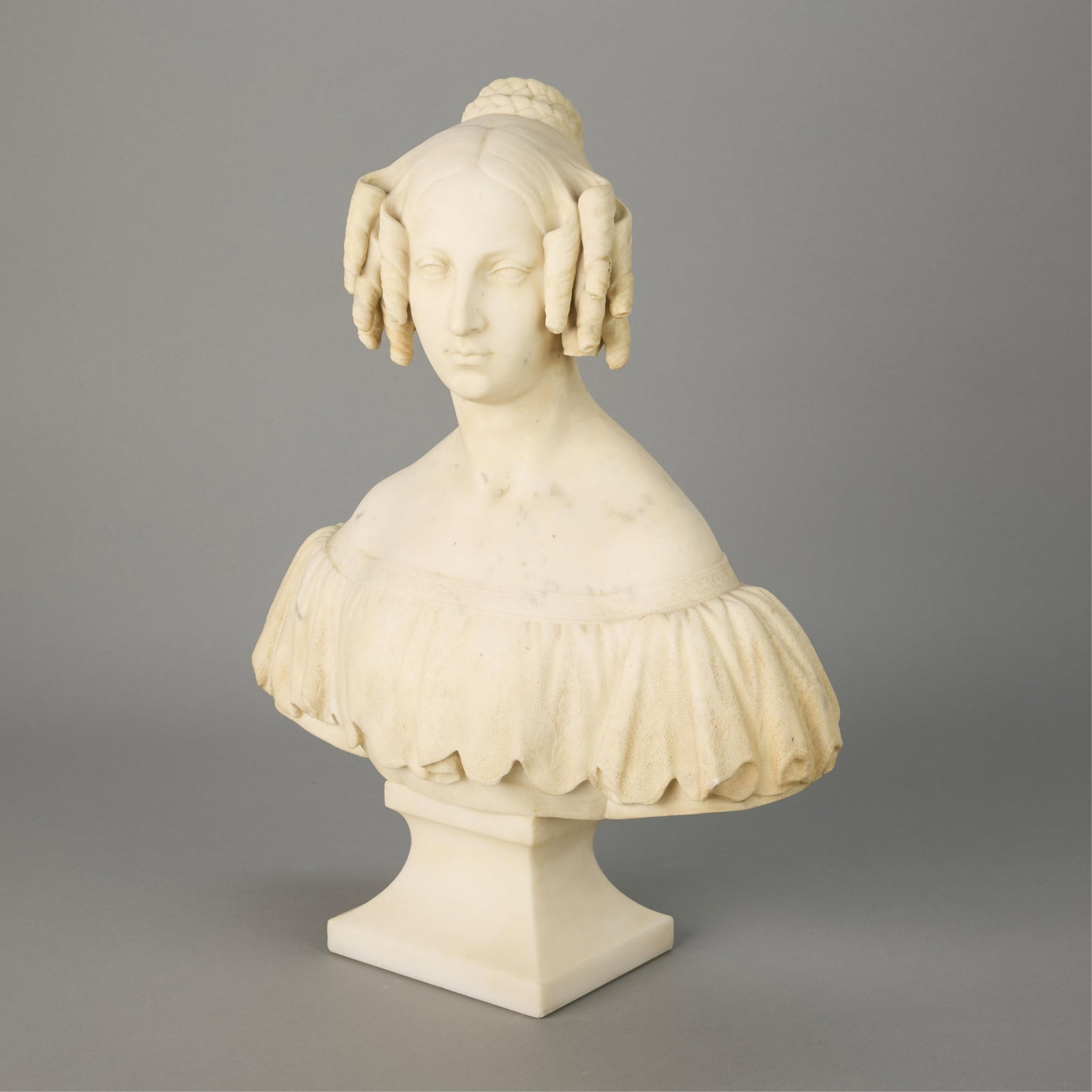 Style of Geefs "Louise-Marie" Marble Bust: Style of Guillaume (Willem) Geefs (Belgian, 1805-1883). Marble bust depicting a solemn woman, her hair arranged in neat curls, resembling Louise-Marie of Orleans (1812-1850), Queen of the Belgians fro
