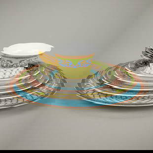 Set 6 Versace for Rosenthal "Russian Dream" Dishes: Versace for Rosenthal, Germany. Set of six porcelain &quot;Russian Dream&quot; line dishes depicting an eclectic array of geometric patterns executed in vibrant colors, with gilt accents and Greek key