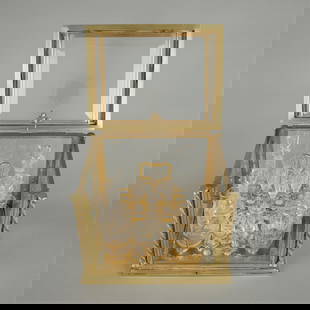 Style of Baccarat Ormolu Gilt Bronze Cave a Liqueur: Style of Baccarat or Napoleon III French ormolu gilt bronze and glass cave a liqueur, ca. 19th century. With an assortment of etched glassware including four decanters and fourteen sherry glasses.Heig