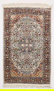 Persian Floral Silk Kashan Rug 5' x 3': Isfahan Iranian or Persian silk Kashan or Nain rug, 20th century. The carpet with profuse floral motifs surrounding a geometric medallion against a cream ground. Bordered with repeating floral and fol