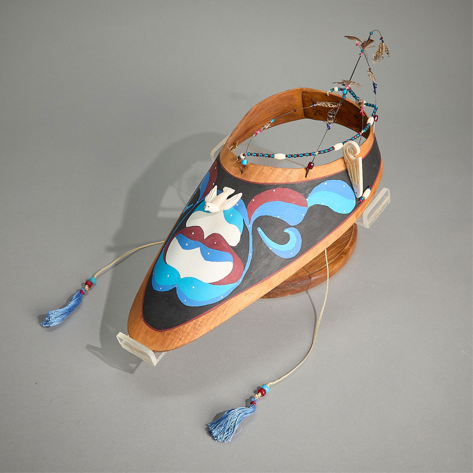 Peter Lind Jr. Aleutian Hunter's Visor: Peter Lind Jr. (Aleut/Alutiiq, (Alaskan, b. 1964). Large bentwood open crown hunting visor, 20th century. With painted geometric motifs, glass beads, feathers, string, and carved organic material. Uns