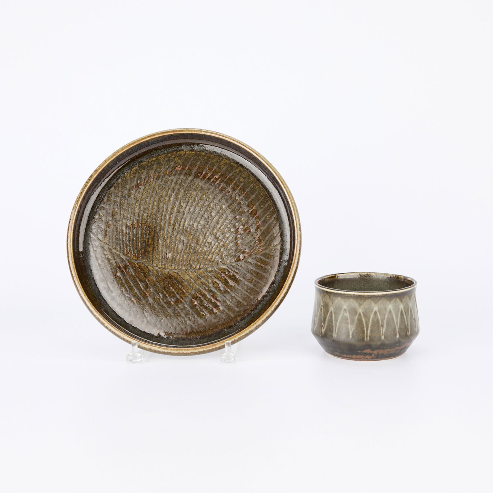 2 CH Stalhane for Rorstrand Ceramic Vessels: Carl-Harry Stalhane (Swedish, 1920-1990). Group of two ceramic vessels including a small bowl with a delicately flared rim and carved "slashing" motif along the exterior in addition to a rolled edge p