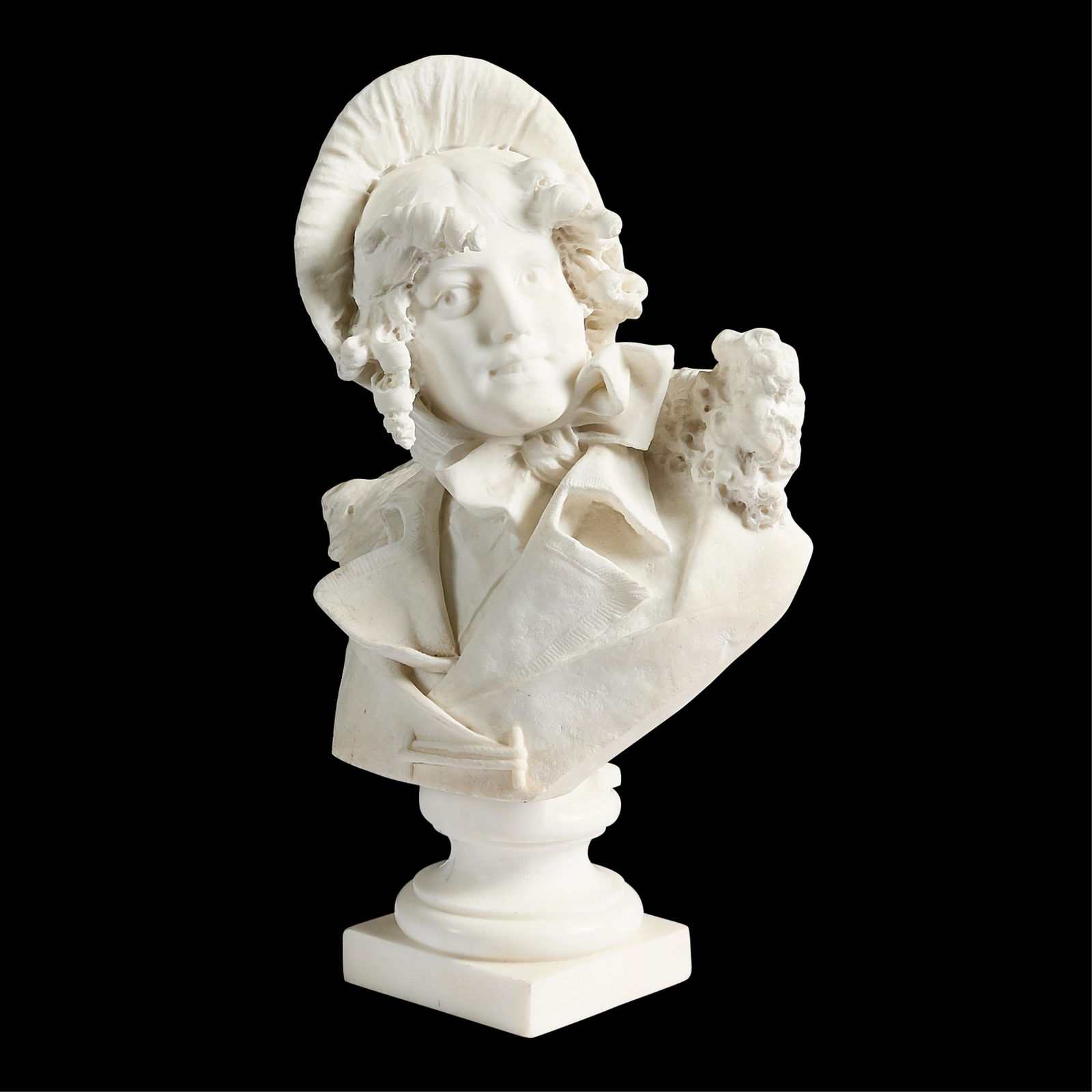 Attributed to Pugi Lady with Hat Marble Bust: Attributed to Filli Pugi (Italian, 19th century). Carved marble bust depicting an expressive woman donning a hat with ringlets of curls draped along either side of her face, 19th century. Incised "Fil