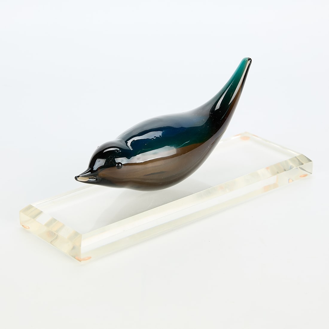 Tyra Lundgren Venini Murano Art Glass Bird w/ Base: Tyra Lundgren (Swedish, 1897-1979) for Venini Murano, Italy. Deep blue art glass bird with acrylic base. "Venini, Italia" etched along the underside of the bird.Lundgren was introduced to glassmaker P
