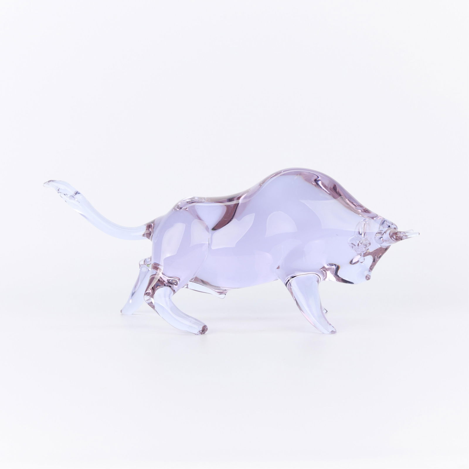 Livio Seguso Unique Murano Glass "Toro" Bull: Livio Seguso (Italian, b. 1930). Pale violet Murano glass figure in the form of an alert bull or "toro", mid-20th century. The bull stands poised, directing its horns forward, haunches and legs firmly