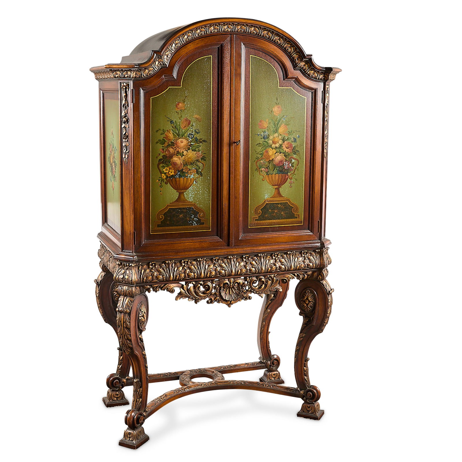 Mid-Century Continental European Painted Cabinet: Continental European mid-century china or wine cabinet, ca. 1940. Depicting polychrome painted floral bouquets along the doors. Featuring an elaborately carved Renaissance Revival skirt resting atop f
