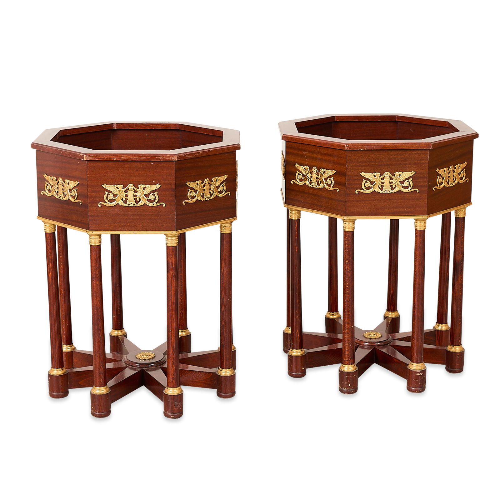 Pr French Empire Style Bronze Mounted Cellarettes: Pair of French Empire style polished bronze mounted cellarettes (wine and liquor coolers) or planters, 19th-early 20th century. Possibly of mahogany. Both featuring octagonal form vessel on fitted sta