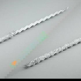 Chinese Carved Jade & Sterling Blade Letter Opener: Chinese letter opener composed of carved jade handle in the form of a dragon with sterling silver blade. The handle carved of a pale green jade with a singular yellow inclusion along the pommel. The b