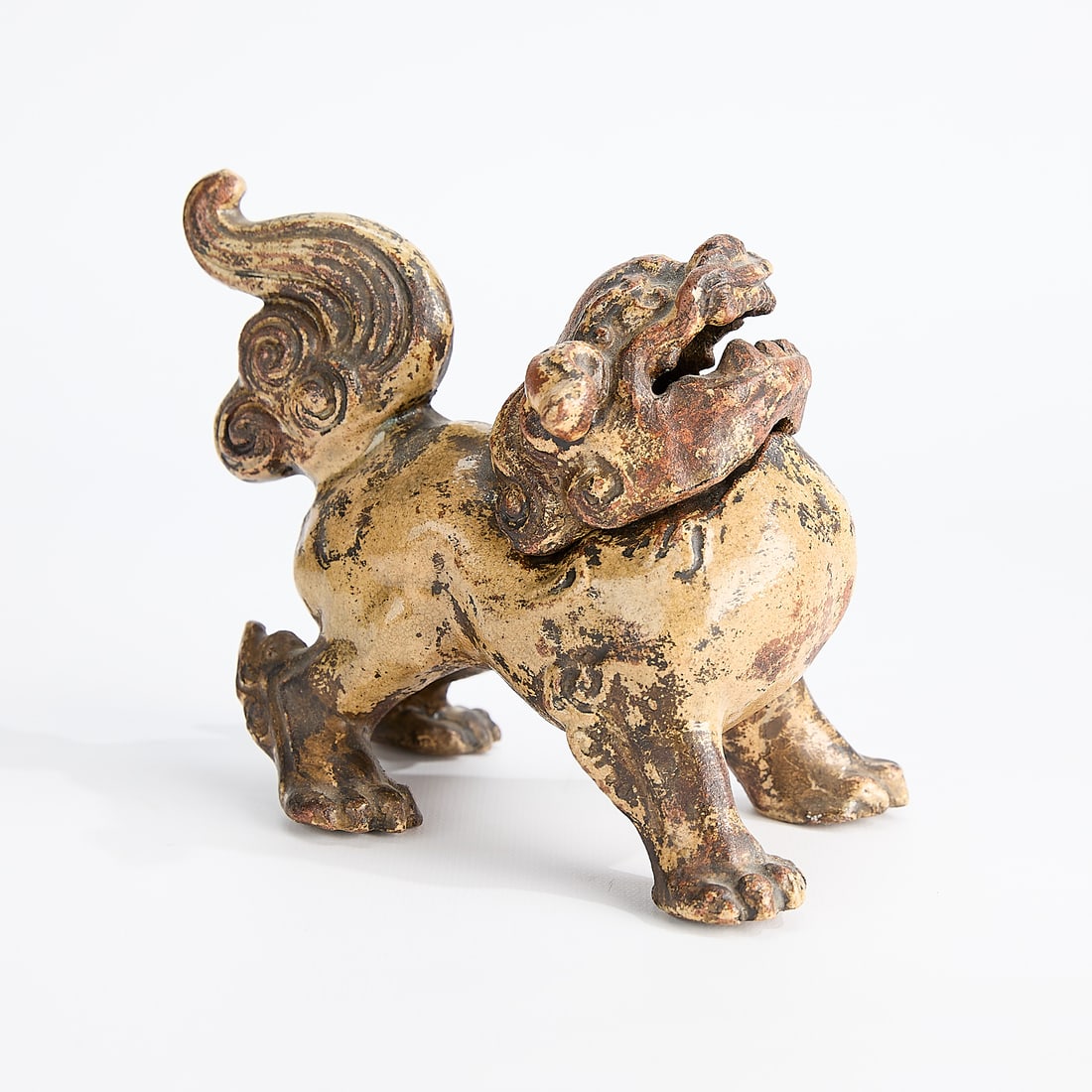 Japanese Pottery Shishi Lion Incense Burner: Japanese ceramic shishi lion or foo dog incense burner or censer. Composed of two pieces: the hollow body, surmounted by a separate head with pierced mouth.Height: 5 in x width: 6 in x depth: 2 1/2 in
