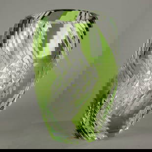 Val St. Lambert Cut Glass Emerald Overlay Vase: Val St. Lambert, Belgium. Art Deco cut glass overlay vase in emerald green. Depicting geometric motifs. Incised mark and numbered "19/62/150" along the underside.Height: 9 1/2 in x diameter: 6 in.