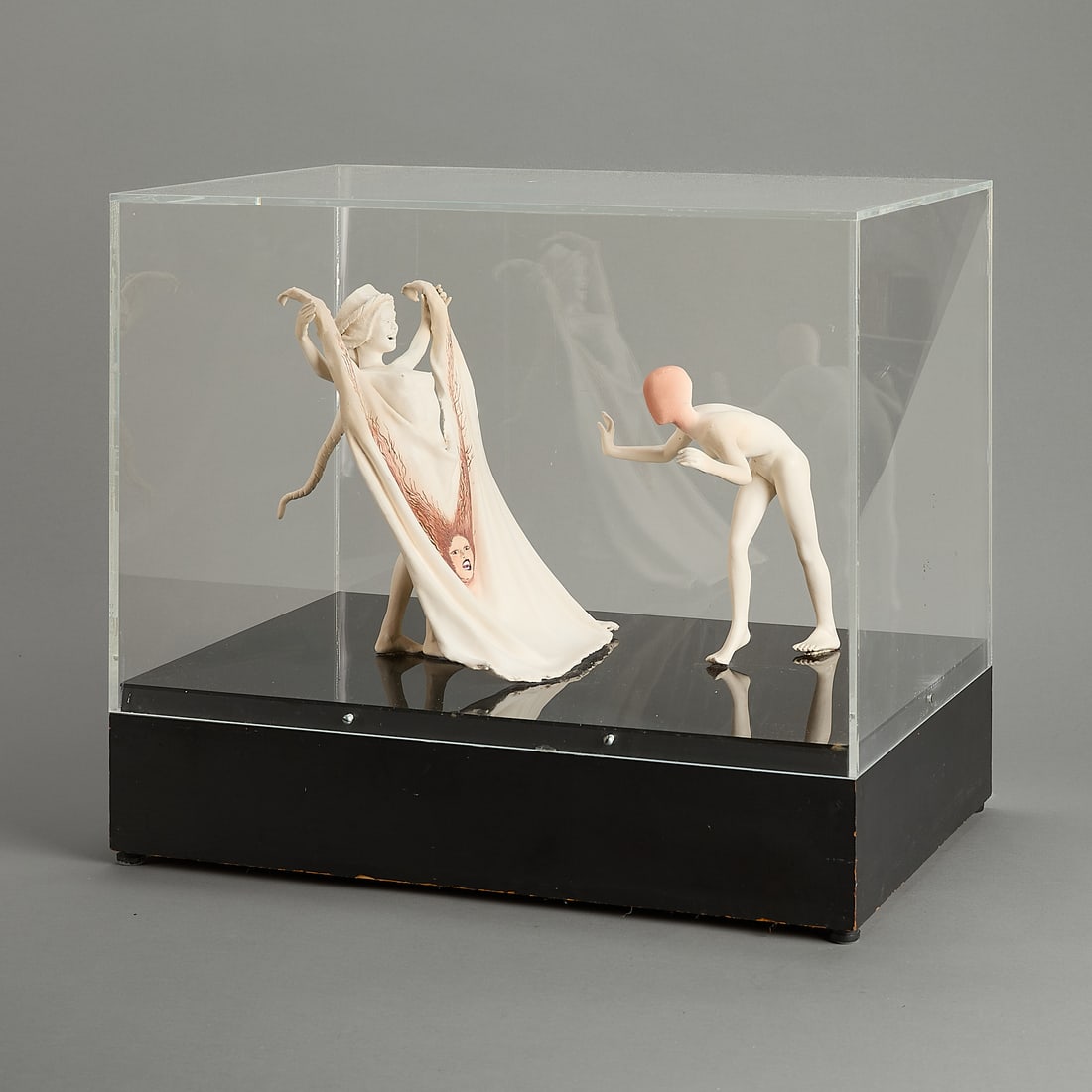 Patti Warashina "Loss of Identity" Clay Sculpture: Patti Warashina (American, b. 1940). Low-fire clay and glaze sculpture titled "Loss of Identity" from the "White Figure" series, 1979. Depicting a smiling nude woman hoisting a blanket with