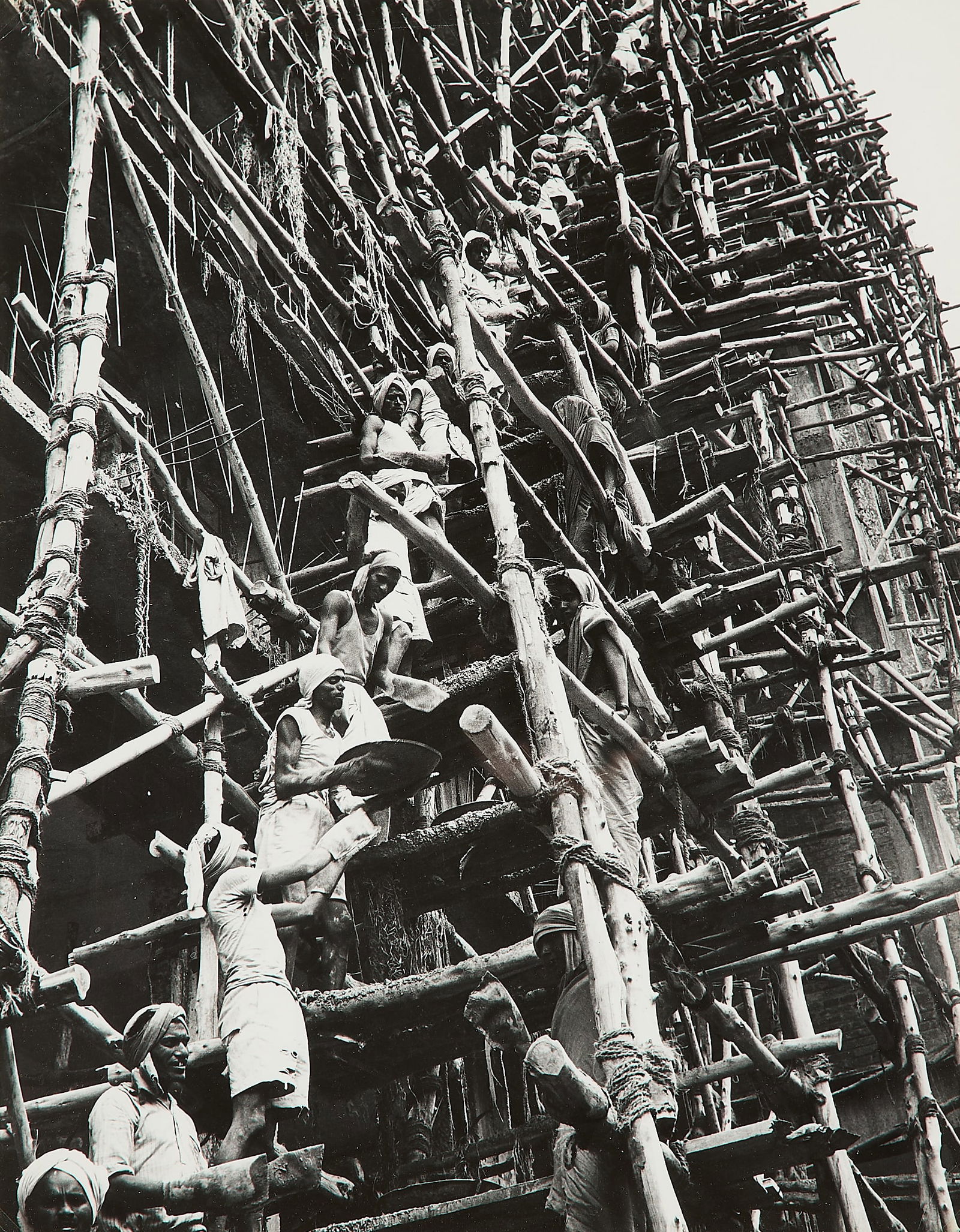 Clemens Kalischer "India-Bangalore, Scaffolds" GSP: Clemens Kalischer (American, 1921-2018). Gelatin silver print photograph titled "India - Bangalore, Scaffolds," 1964.Provenance: Villa Grisebach Auktionen, Lot 1218, Germany, 2003; From the Estate of