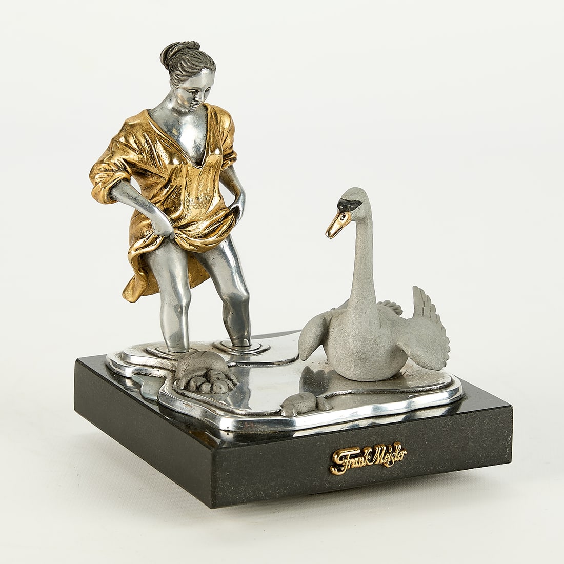 Frank Meisler "Leda and the Swan" Sculpture: Frank Meisler (Israeli, 1929-2018). Art Deco metal alloy sculpture with silver- and gold-plated elements titled "Leda and the Swan," depicting the Greek myth in which mortal Leda is seduced by god Zeu