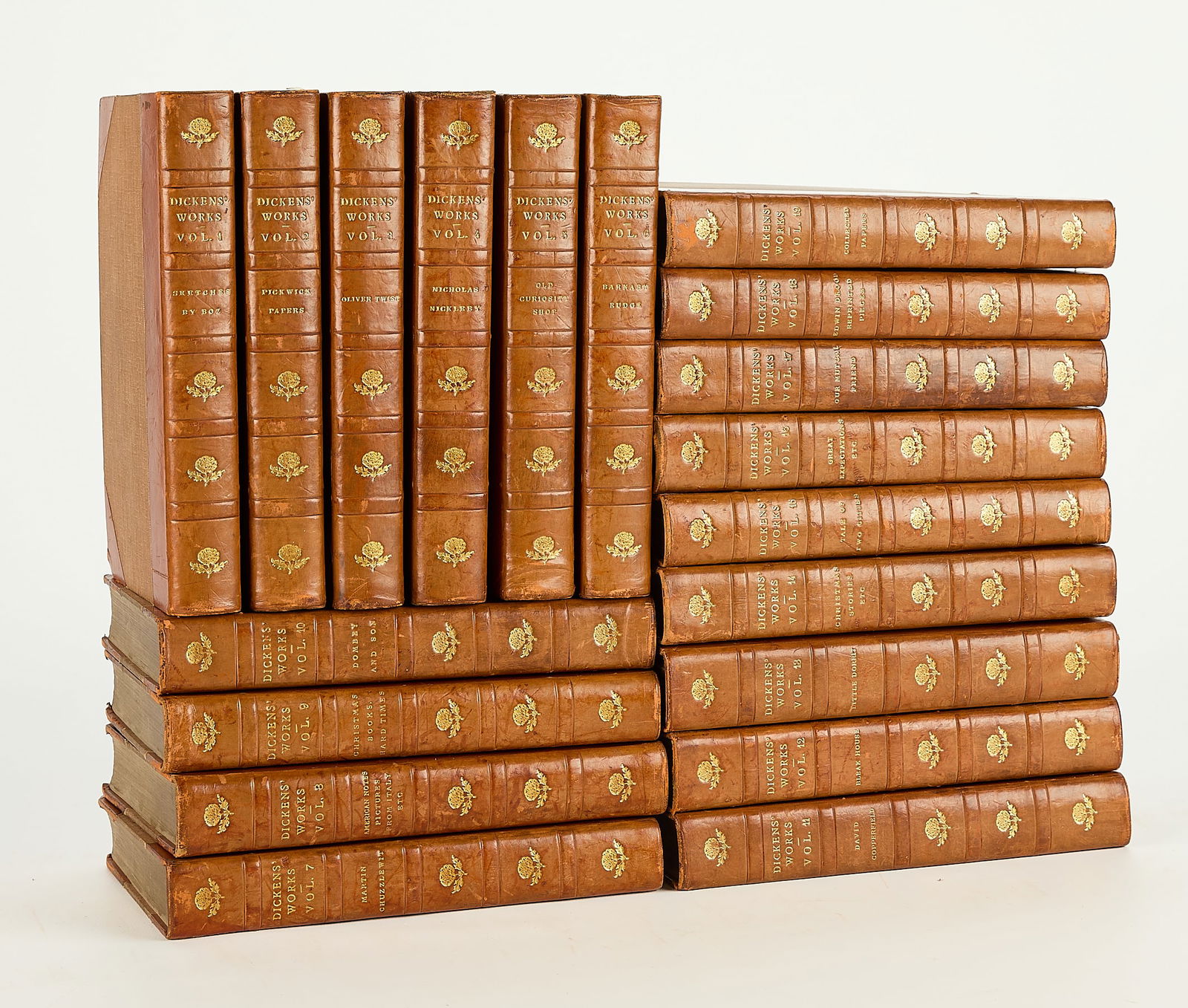 Set 19 Vols. "Works of Charles Dickens" 1902-1903: Charles Dickens, "The Biographical Edition of: The Works of Charles Dickens," London: Chapman & Hall, 1902-1903, volumes 1-19. Each with a Charles Dickens centenary or cinderella stamp pasted along
