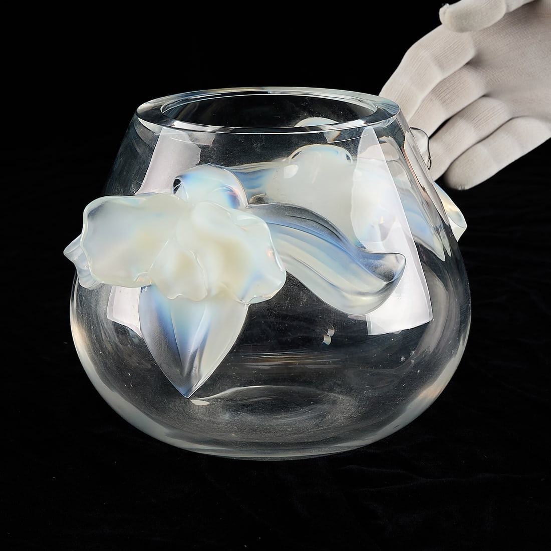 20th c. Lalique Glass "Orchidee" Rounded Vase: Lalique, France. Crystal glass "Orchidee" rounded vase or bowl. Depicting orchids molded in contrasting clear and frosted glass. Marked along the underside.Height: 6 1/2 in x width: 8 1/2 in x diamete