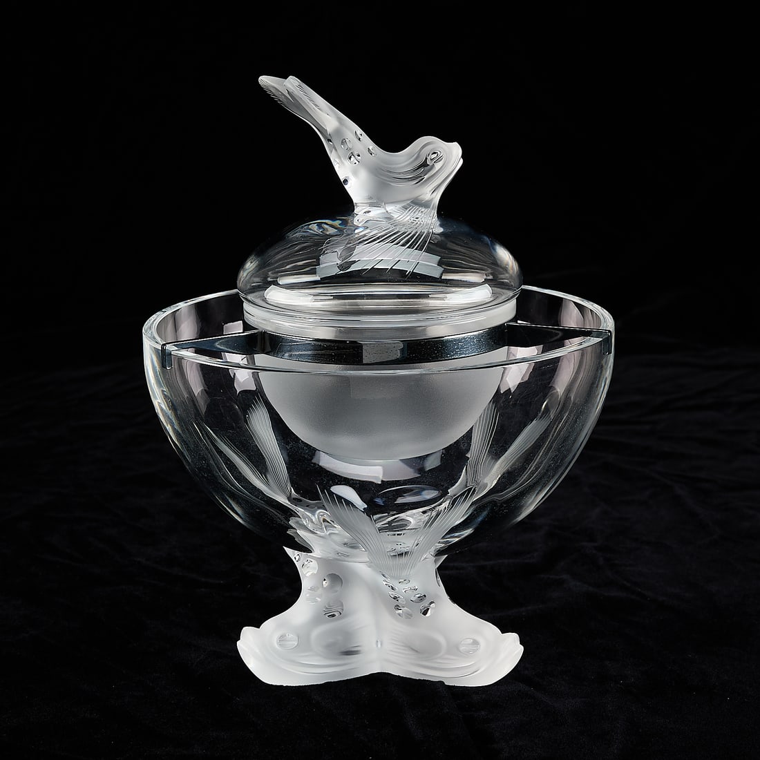 20th c. Lalique Crystal "Igor" Caviar Server Bowl: Lalique, France. Caviar serving bowl in pattern "Igor," 20th century. With molded handle and tripod pedestal base, each depicting Renaissance-style dolphins, frosted interior bowl, and silverplate sta