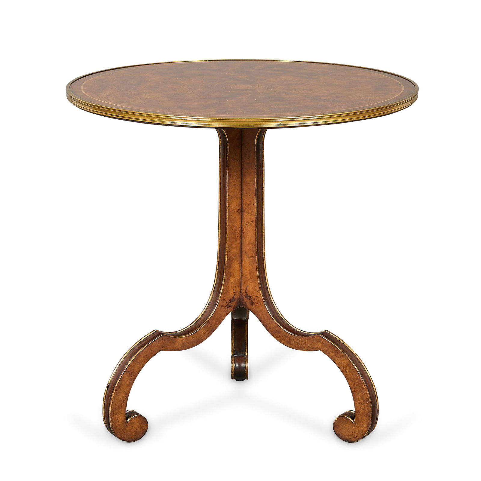 Theodore Alexander Regency Style Wood Side Table: Theodore Alexander, United States. Regency-style wooden side or accent table with tripod pedestal base and brass accents. Maker's label along the underside. Height: 26 1/2 in x diameter: 26 in.