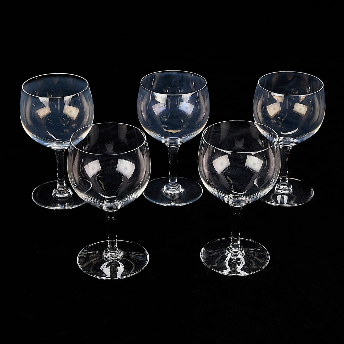 Set 5 Baccarat "Montaigne" Crystal Wine Glasses: Baccarat, France. Set of five "Montaigne (Optic)" pattern crystal blown glass stemware water goblets or claret (red wine) glasses, 20th century. Each with etched mark along the underside.(Each) Height