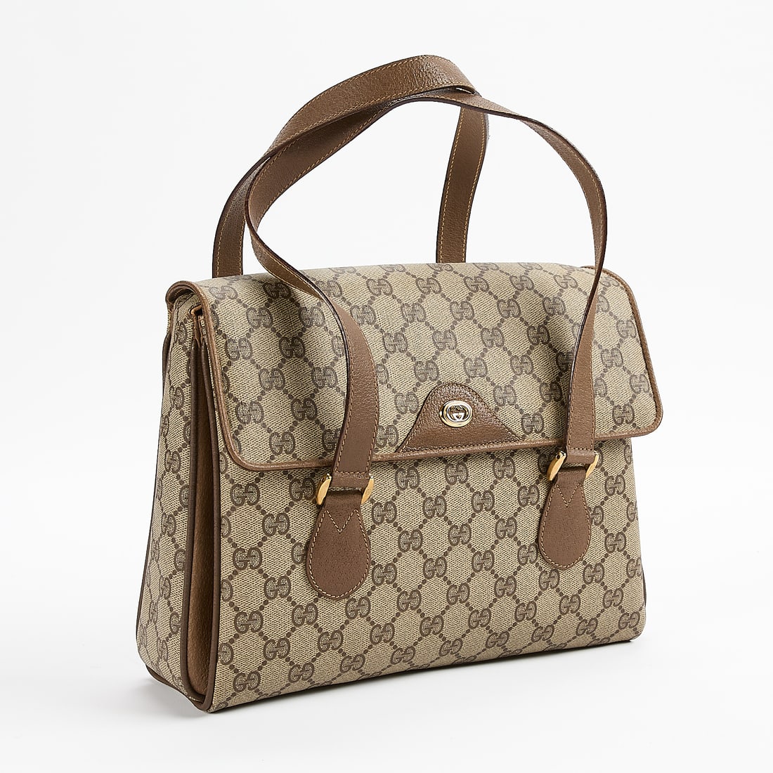 Gucci GG Supreme Vintage Bag: Gucci GG Supreme top handle vintage bag. In beige and brown GG monogram with taupe leather trim and handles. With fold over snap closure and three interior sections and interior zipper pouch. Leather