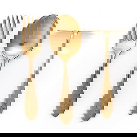 Gorham 14k Yellow Gold Childrens Flatware: Gorham 14k yellow gold children's flatware set comprised of a small fork, spoon and pusher. Each marked along the underside with the Gorham gold mark of the lion and anchor and 14k. In a Cartier silve