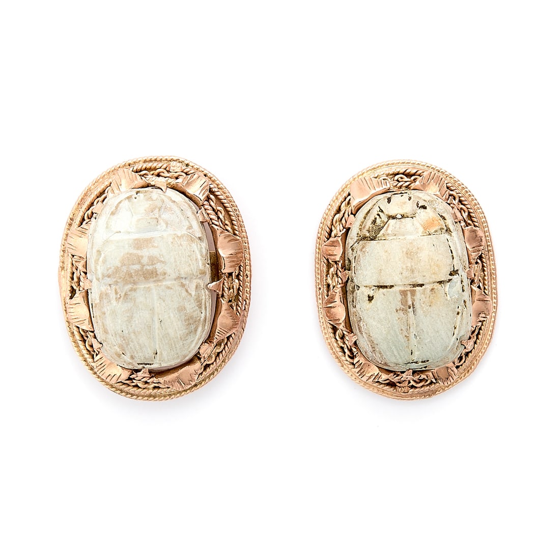 Arabic 14k Gold & Scarab Earrings: 14k yellow gold filigree frame stud earrings, each set with carved steatite scarabs. The scarab body carved along the front, with hieroglyphics carved along the back. Each scarab with holes, formerly