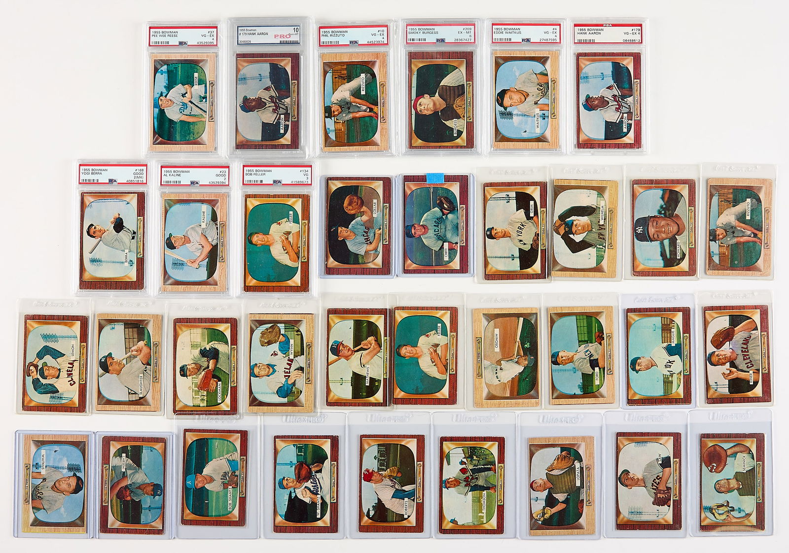 34 1955 Bowman Cards Some Graded: Group of thirty-four 1955 Bowman baseball cards, eight graded by PSA/DNA, one graded by PRO. Including:Graded by PSA/DNA: #4 Eddie Waitkus (VG-EX 4, 27487); #10 Phil Rizzuto (VG-EX 4, 44523974); #23 A